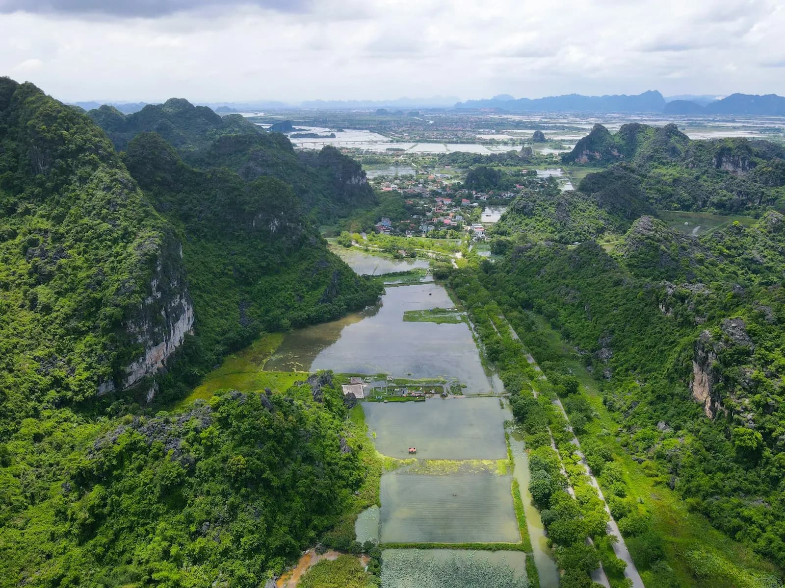 Limestone karst peaks over flooded rice paddies in Ninh Binh, northern Vietnam