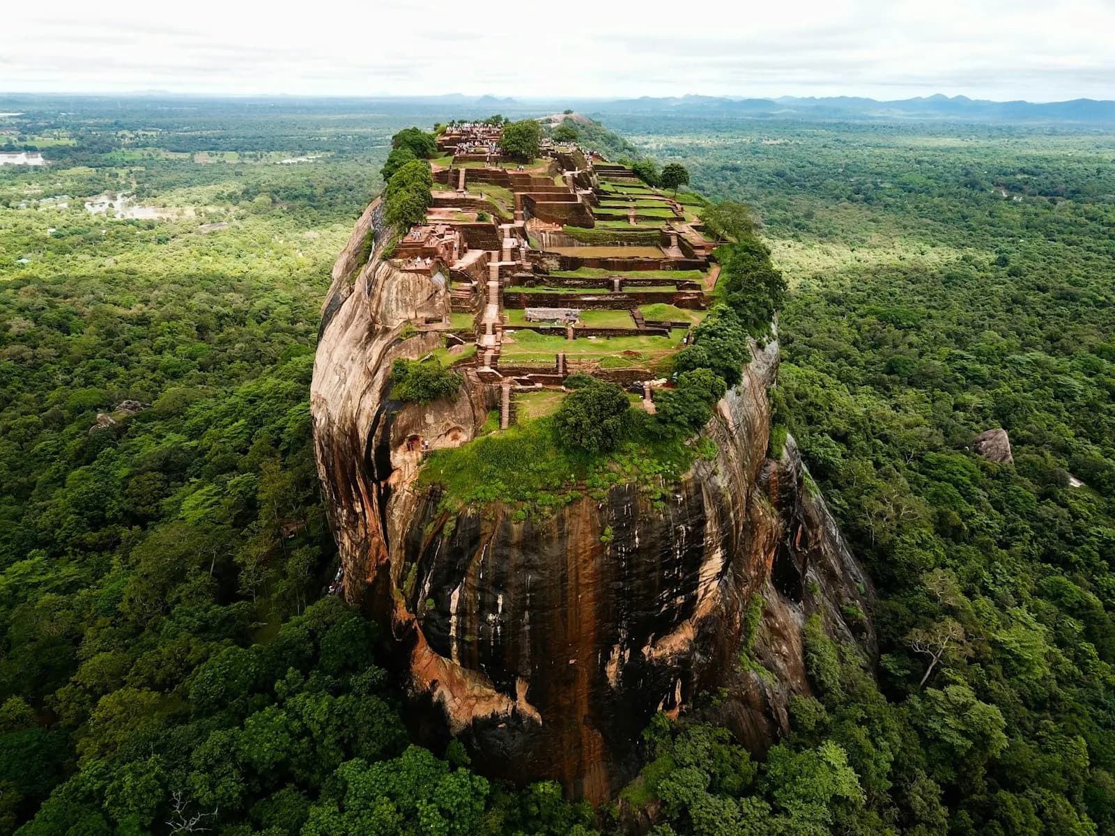Sigiriya rock fortress rising out of the jungle, seen from above